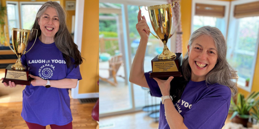 Laila Trogneux-Goosen smiles with the trophy she won for her snort laugh