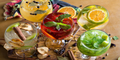 A table full of festive looking cocktails.